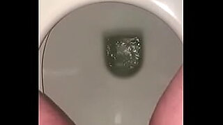 old grandpa pissing on toilet