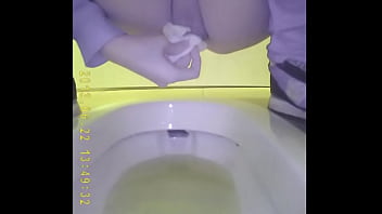piss in the dirty toilet closeup