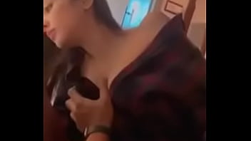 licking and sucking her nipple