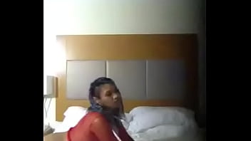 mom and son shares bed in a motel room vacation